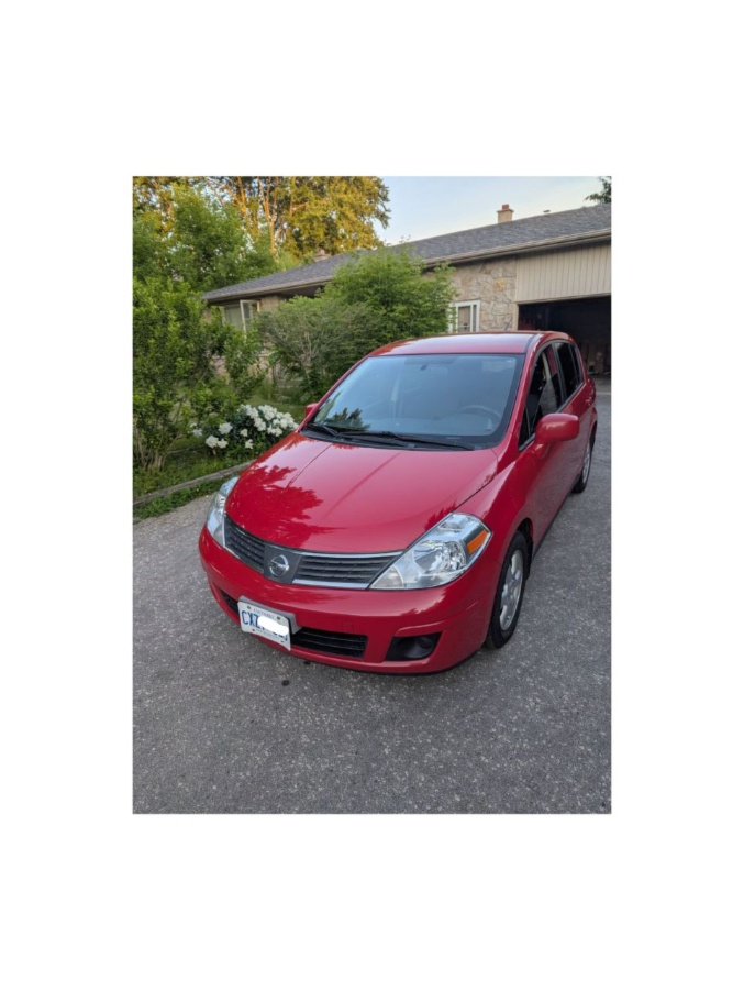Nissan Versa,  1.8L